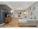 Open-concept living room with fireplace, mounted TV, and comfortable seating for entertaining at 4539 E Caley Pl, Centennial, CO 80121