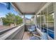 Private balcony with seating, providing a relaxing outdoor space and community views at 1308 S Danube Way # 102, Aurora, CO 80017