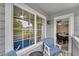 Balcony with windows to the inside and seating offering a cozy outdoor retreat at 1308 S Danube Way # 102, Aurora, CO 80017