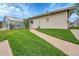 Community building with access to the fitness center and pool, with landscaped lawn at 1308 S Danube Way # 102, Aurora, CO 80017