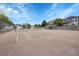 Outdoor tennis court with a well-maintained surface and net, perfect for recreational play at 1308 S Danube Way # 102, Aurora, CO 80017