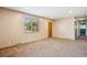 Spacious living room with a neutral color palette and lots of natural light at 1060 Saulsbury St, Lakewood, CO 80214