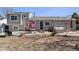 Backyard with a patio, a grill, and a lawn at 3953 S Richfield St, Aurora, CO 80013