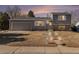 Charming two-story home with a well-maintained front yard and attached garage, set in a lovely neighborhood at 3953 S Richfield St, Aurora, CO 80013