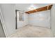 Unfinished basement space with concrete floors, window, wrapped walls, and exposed ceiling at 11674 Claude Ct, Northglenn, CO 80233
