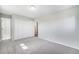 Bedroom with ensuite bathroom and double door closet at 11674 Claude Ct, Northglenn, CO 80233