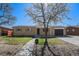 Charming single-story home with a well-manicured front yard and an attached one-car garage at 11674 Claude Ct, Northglenn, CO 80233