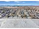 Birds eye view of home surrounded by snowy residences at 1180 Crenshaw St, Castle Rock, CO 80104
