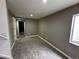 Neutral bedroom offers carpet and one window for natural light at 1180 Crenshaw St, Castle Rock, CO 80104