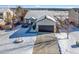 Beautiful single Gathering home featuring a driveway with a large garage and a well manicured lawn at 1180 Crenshaw St, Castle Rock, CO 80104