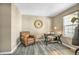 A cozy home office with a comfortable leather chair, modern desk, and ample natural light at 1180 Crenshaw St, Castle Rock, CO 80104