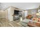 Bright living room featuring stylish wood floors, comfortable seating, and modern decor for relaxed living at 1180 Crenshaw St, Castle Rock, CO 80104