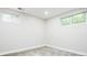 Neutral bedroom with carpet and two bright windows overlooking the yard at 1757 S Van Dyke Way, Lakewood, CO 80228