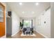Bright dining room with recessed lighting, wood floors, and stylish dining set at 1757 S Van Dyke Way, Lakewood, CO 80228