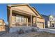 Inviting home featuring a cozy front porch perfect for relaxing and enjoying the neighborhood views at 222 Fox St, Bennett, CO 80102