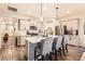 Stylish kitchen island with seating and modern appliances, enhancing the cooking and dining experience at 222 Fox St, Bennett, CO 80102