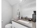 Bathroom with a white vanity, quartz countertop, and modern fixtures at 3103 W 18Th Ave, Denver, CO 80204