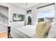 Bright bedroom featuring a tv, neutral walls, and many windows at 3103 W 18Th Ave, Denver, CO 80204