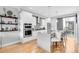 Modern kitchen boasts stainless steel appliances, a center island, and sleek cabinetry at 3103 W 18Th Ave, Denver, CO 80204