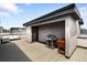 Rooftop deck area including a gas grill, storage, and lounge seating at 3103 W 18Th Ave, Denver, CO 80204