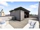 Spacious rooftop deck with outdoor kitchen and lounge area at 3103 W 18Th Ave, Denver, CO 80204