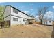 Backyard showing siding, shed, patio, and lawn area at 1001 S Nucla St, Aurora, CO 80017