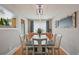 Elegant dining room with modern lighting, stylish decor, and ample seating for Gathering gatherings and dinners at 1001 S Nucla St, Aurora, CO 80017