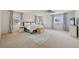 Spacious main bedroom with ceiling fan and plenty of natural light and carpet floors at 1001 S Nucla St, Aurora, CO 80017