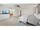 Large main bedroom featuring carpet floors, ensuite bath, and plenty of closet space at 1001 S Nucla St, Aurora, CO 80017