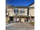Charming townhome featuring attached garages, brick accents and neutral-toned siding for a welcoming curb appeal at 1785 Morrison Ct, Superior, CO 80027