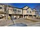 Charming townhome exterior with attached garages, brick accents, and professional landscaping at 1785 Morrison Ct, Superior, CO 80027