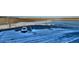 Community parking lot next to frozen pond and open field at 1785 Morrison Ct, Superior, CO 80027