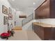 Finished basement with wet bar, modern cabinets, and stair access to upper levels at 318 Adams St, Denver, CO 80206