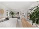 Serene bedroom with white walls, fireplace, and natural light at 318 Adams St, Denver, CO 80206