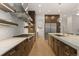 Modern kitchen with marble countertops, stainless steel appliances, and custom cabinetry at 318 Adams St, Denver, CO 80206