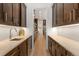 Modern kitchen with wood cabinets, marble countertops, and stainless steel sink at 318 Adams St, Denver, CO 80206