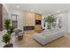Bright living room with fireplace, hardwood floors and sliding doors to the backyard at 318 Adams St, Denver, CO 80206