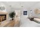 Bright and spacious main bedroom featuring a modern fireplace, contemporary decor, and ensuite access at 318 Adams St, Denver, CO 80206