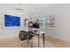 Bright and airy office space with sleek desk, ample natural light, and modern lighting fixtures at 318 Adams St, Denver, CO 80206