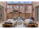Private outdoor patio area with comfortable seating and a fire pit, perfect for entertaining at 318 Adams St, Denver, CO 80206