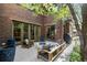 Outdoor patio with comfortable seating around a fire pit at 318 Adams St, Denver, CO 80206