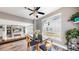 Bright dining area with modern decor that opens to the living room, creating a connected and inviting space at 4826 S Ireland St, Aurora, CO 80015