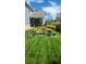 House exterior highlighting the well-maintained lawn and vibrant landscaping at 4826 S Ireland St, Aurora, CO 80015