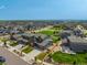 This aerial shows the backyard and how it is surrounded by a wood fence at 9350 Dunraven St, Arvada, CO 80007