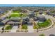 This aerial shows the front yards of several homes at 9350 Dunraven St, Arvada, CO 80007