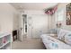 Cozy bedroom features a bed with Paris-themed bedding and ample closet space at 9350 Dunraven St, Arvada, CO 80007
