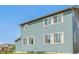 This is a view of the siding and windows of this two story home at 9350 Dunraven St, Arvada, CO 80007