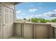 Cozy outdoor balcony offering fresh air and a scenic view at 3100 S Federal Blvd # 232, Denver, CO 80236