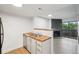 Updated kitchen with butcher block countertops and stainless steel appliances at 3100 S Federal Blvd # 232, Denver, CO 80236