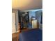 Bedroom features a spacious closet and natural light at 19645 E Buchanan Pl, Aurora, CO 80011